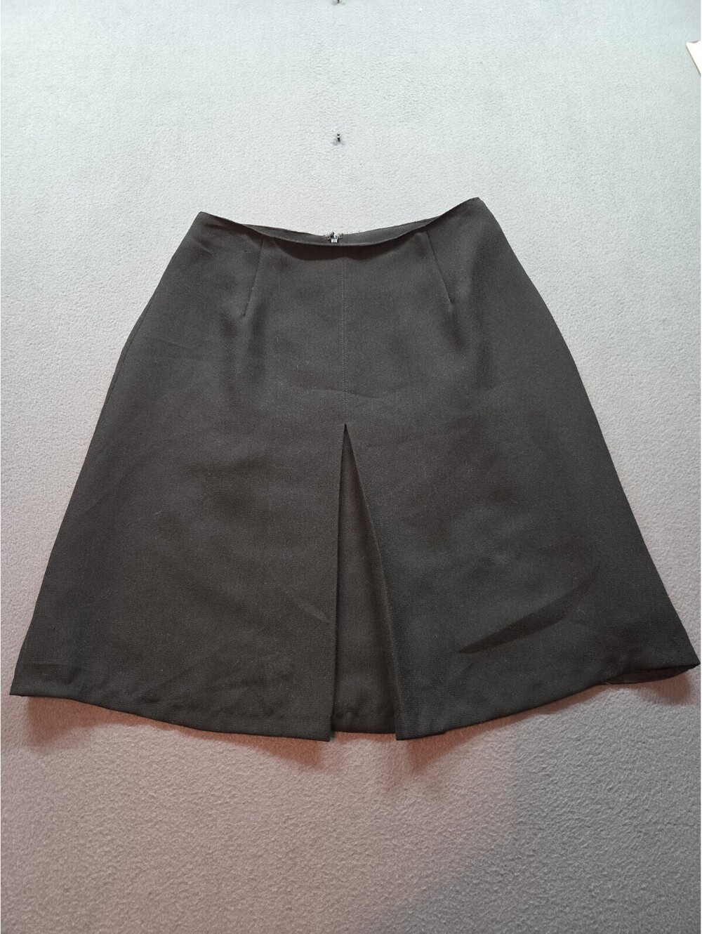 women's black A-line pleated skirt by Metro Collection size 4